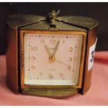 MID 20TH CENTURY EUROPA GILT METAL CASED TRAVELLING CLOCK