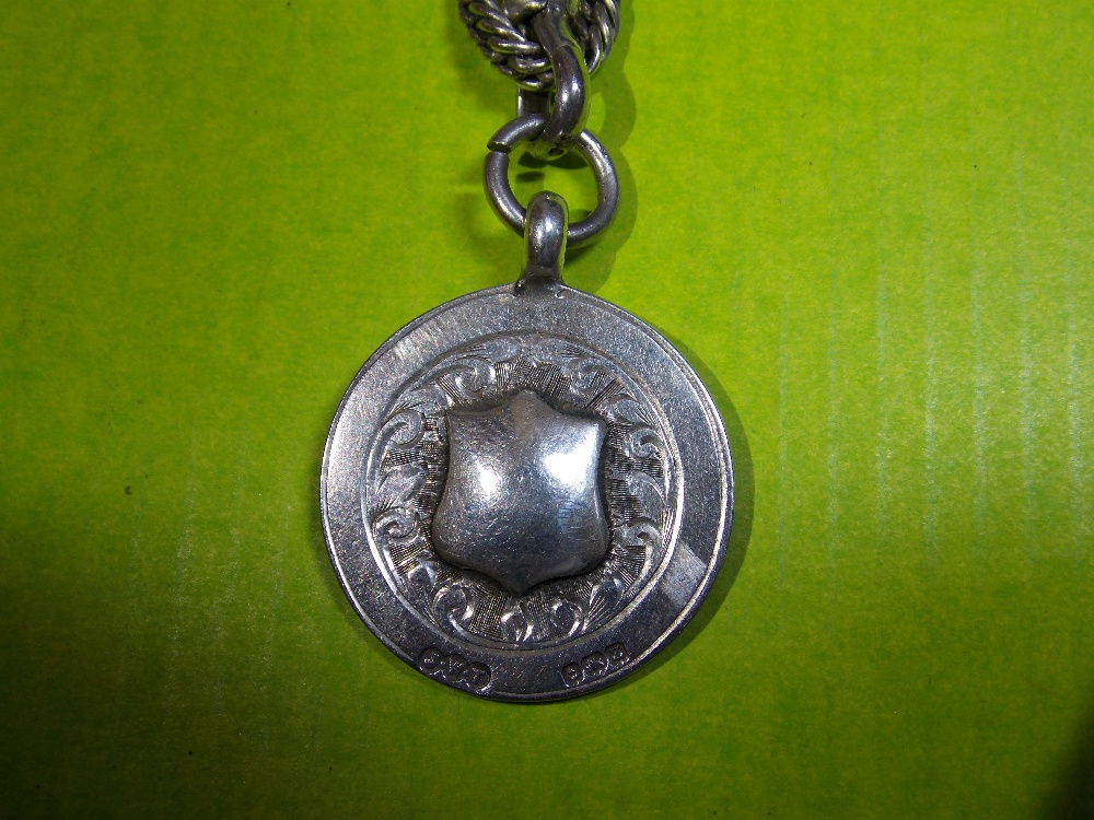 SILVER CIRCULAR DISC MEDALLION WITH SHIELD CARTOUCHE ON SILVER GUARD CHAIN - Image 3 of 5