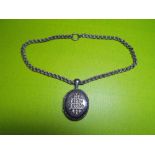 SILVER ROPE EDGED AND ENGRAVED LOCKET AND CHAIN