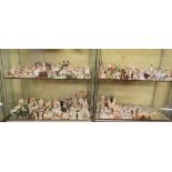 FOUR SHELVES OF LATE 19TH CENTURY THURGURIAN FIGURES,FAIRINGS,