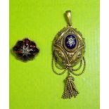 VICTORIAN GILT METAL OVAL ENAMEL AND SEED PEARL PENDANT HAIR LOCKET AND A LOBED PANELLED AND STAR