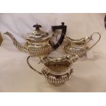 BIRMINGHAM SILVER THREE PIECE BACHELOR TEA SERVICE WITH GADROONED DECORATION