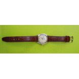 A GENTLEMANS VINTAGE GOLD CASED ROLEX OYSTER PERPETUAL CHRONOMETER WRIST WATCH ON LEATHER STRAP