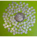 A BAG OF MINIATURE SILVER INDIAN COINS