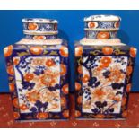 PAIR OF 19TH CENTURY IMARI SQUARE SECTION TEA CADDIES AND COVERS,