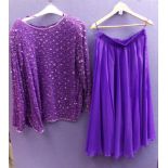 LADIES TWO PIECE PURPLE SKIRT AND TOP,