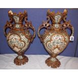 PAIR OF CONTINENTAL STONEWARE TWIN HANDLED OVOID VASES,