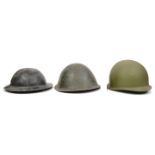 2 WWII period British civilian steel helmets; 2 USA helmets; and another. Generally GC (some