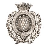An officer’s silver plated pouch belt badge of the Royal Cornwall Militia or Duke of Cornwall’s