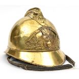 A French fireman’s lacquered brass Adrian style helmet of the Sapeurs Pompiers d’Etrepagny, skull