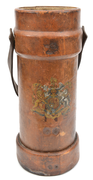 A brown leather shell bucket, with post 1902 R Arms, supporters and motto, carrying handle on