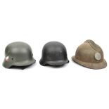 2 WWII French navy “Adrian” helmets, with fouled anchor roundels; a USA dispatch rider’s helmet with