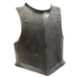 A heavy mid 17th century “Cromwellian” breast plate, with plain turned over edges around the arms