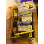 A small quantity of Dinky Toys. A Blaw Knox bulldozer No.961, Euclid Rear Dump Truck No.965, a