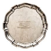 A presentation silver tray, with gadrooned border and 835 purity mark. Engraved “Adolf Bachmann