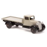 Dinky Toys Flat Truck 25c. A fine example with stone coloured body, black chassis and black ridged