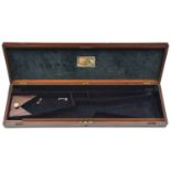 A mahogany case for a DB percussion sporting gun, c 1835, brass hook fasteners, lock and circular