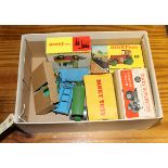 7 Dinky Toys. A Dumper Truck (562) in yellow with red wheels. A Motocart (342) in green with brown