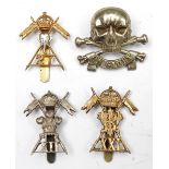 4 cavalry cap badges: 12th L crossed lances, 17th L, all brass 21st L and 27th L. GC to VGC