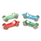 4 Dinky Toys. A Cooper-Bristol Racing Car (23G) with green body, green wheels and grey tyres, an