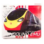 A Dapol & Virgin Trains set. Cover with Richard Branson original signature. A Pendolino EMU with