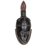 An old African darkwood tribal mask, stylized features and “beard”, ornamental “reversed mitre”