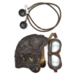 A WWII leather flying helmet, with Mk VIII goggles, Gosport speaking tube and earpieces. GC (some