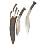 A Kukri, in sheath with 10 various companion knives, etc (others missing, sheath split) and