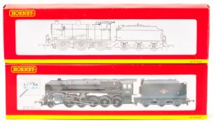 2 Hornby Railways Locomotives. A BR class 9F 2-10-0 tender locomotive 92134 (R2200A). Together