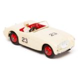 Dinky Toys Austin Healey 100 (109). An example with cream body, white driver, red interior and