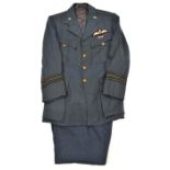 A WWII RAFVR Squadron Leader’s jacket, embroidered pilot’s wings, medal ribbon DFC and bar, VR lapel