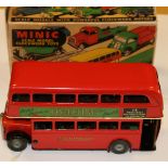 A Tri-ang Minic tinplate clockwork London Transport Double deck bus. In LT livery with Destination