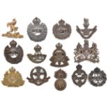 12 officer’s bronze cap badges: RE (3), R Welsh Fus, Loyals, R W Kent (blades AF), Middlesex, DLI,