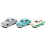3 early Corgi Toys. Ford Consul in green and cream, Austin Cambridge in turquoise and a Rover 90
