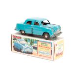 An early 1950’s Tri-ang Minic tinplate clockwork Ford Zephyr Six saloon. In mid blue withy red