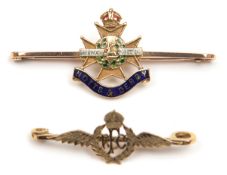 A gold coloured “sweetheart” tie pin of The R Flying Corps, and another enamelled gold and silver