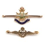 A gold coloured “sweetheart” tie pin of The R Flying Corps, and another enamelled gold and silver