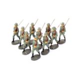 10 Elastolin German Army figures. 10 marching with rifles shouldered. GC for age, minor cracking.
