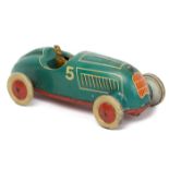 A 1930’s tinplate clockwork penny toy open topped racing car. No marking but has Tipp & Co cream and