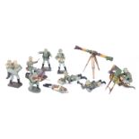 9 Elastolin German Army figures. 2 with range finders, large and small, soldier with wounded