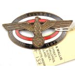 A Third Reich oval enamelled pin back badge of the Military Command in Norway, large eagle and