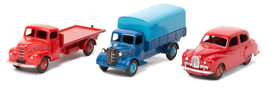 3 Dinky Toys. Austin Wagon (30S) in dark blue with mid blue tinplate rear tilt with mid blue wheels.
