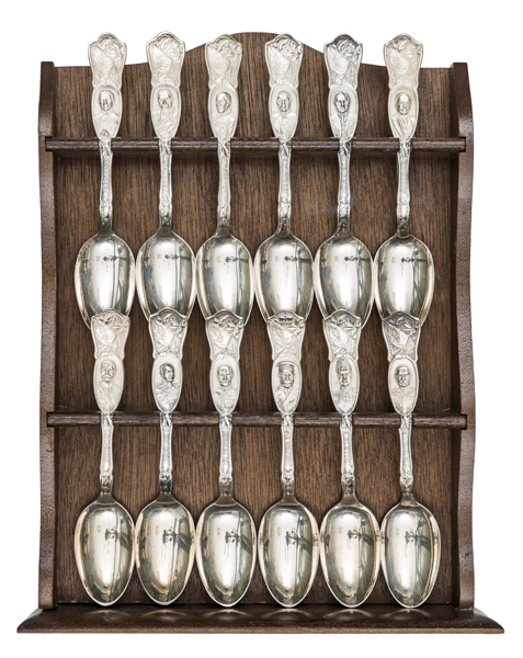 A WWI commemoration set of 12 silver plated spoons (6” length) depicting the leaders of Armed Forces