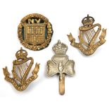 4 WWI Irish badges: Dublin Regt National Volunteers and 14th Bn R Irish Rifles caps; pair cap size