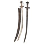 A tulwar, curved, triple fullered blade 28”, iron hilt with crossguard, langets, dish pommel, shaped