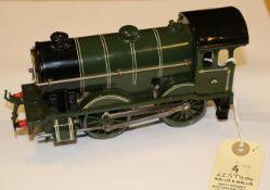 A Hornby O Gauge No.1 Special clockwork 0-4-0 tender locomotive. Finished in lined Southern green