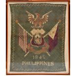 A WWII woven coloured raffia panel to celebrate the Liberation of the Philippine Islands, 1945,
