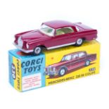 Corgi Toys Mercedes-Benz 220SE Coupe (230). An example in solid maroon with yellow interior.