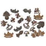 11 pairs officer’s bronze collar/lapel badges, including Queens, Buffs, R Fus, Kings, SWB,