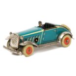 A 1930’s tinplate clockwork penny toy open topped sports car. Marked foreign and of German